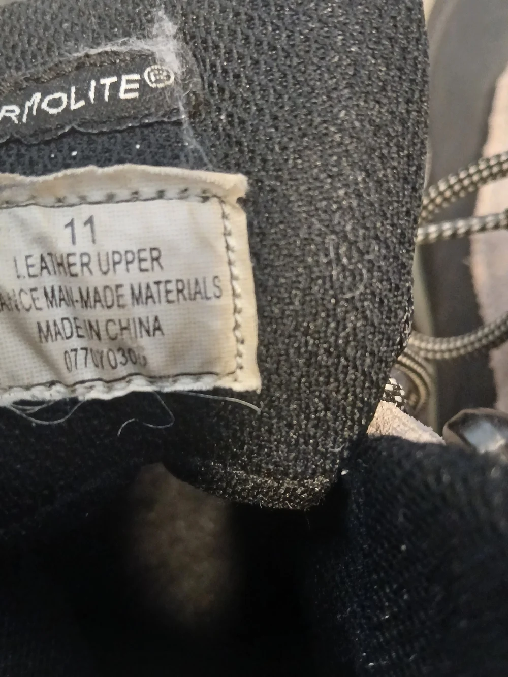 Polaris Thermolite hiking boots feature a gray suede upper with a blk rubber Sol